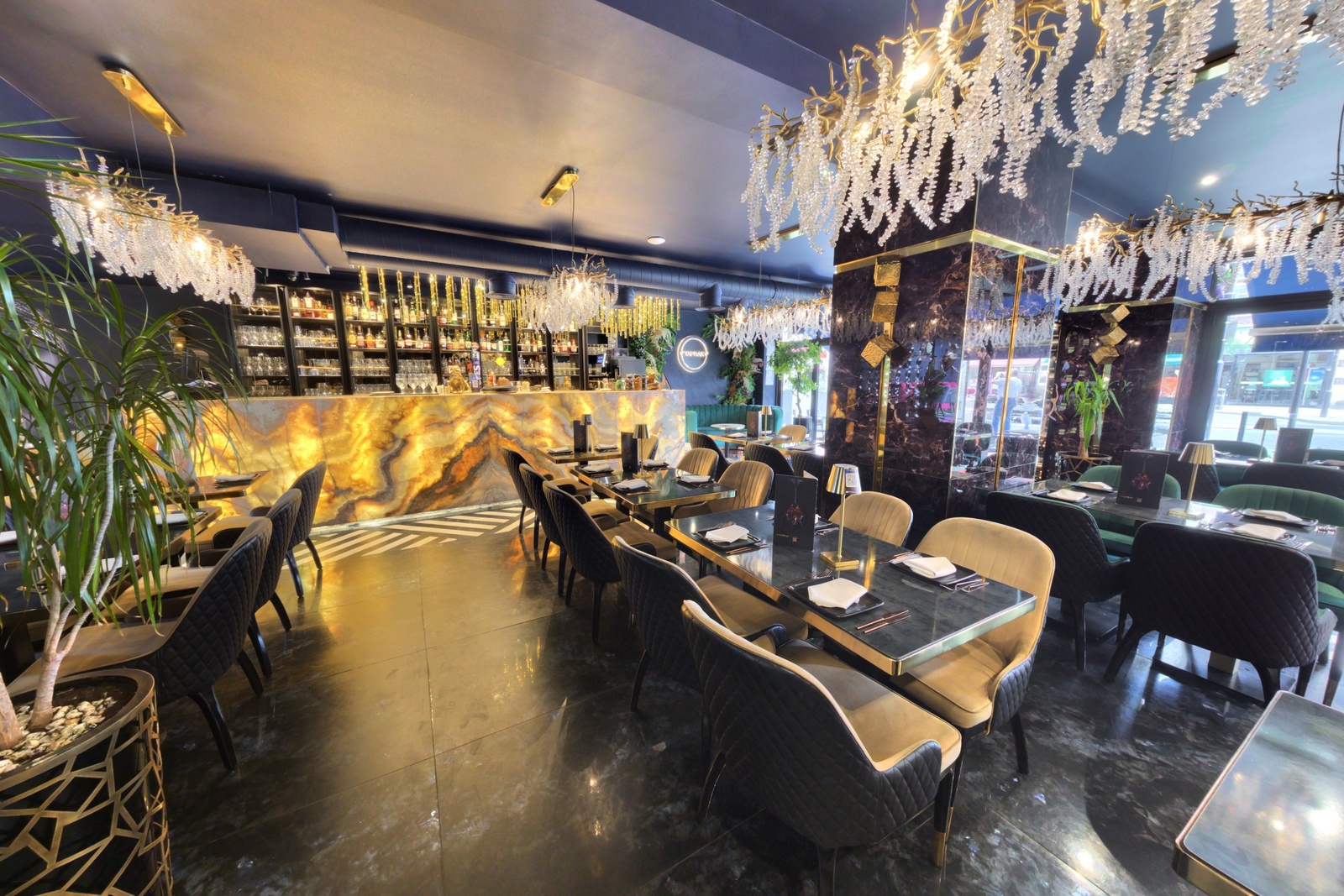 Glamorous restaurant interior with crystal chandeliers — a characterful film location